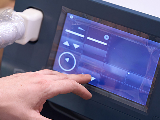 Medical‑grade touchscreen integrated into a device enclosure