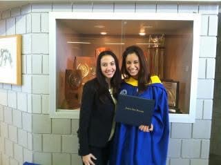 Gisell pictured in cap and gown at college graduation